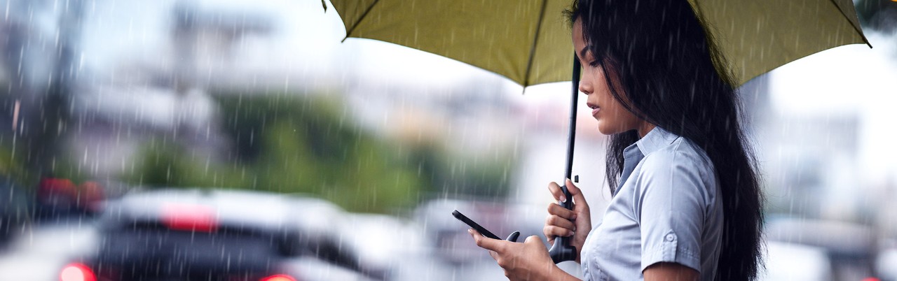 woman-on-phone-in-rain